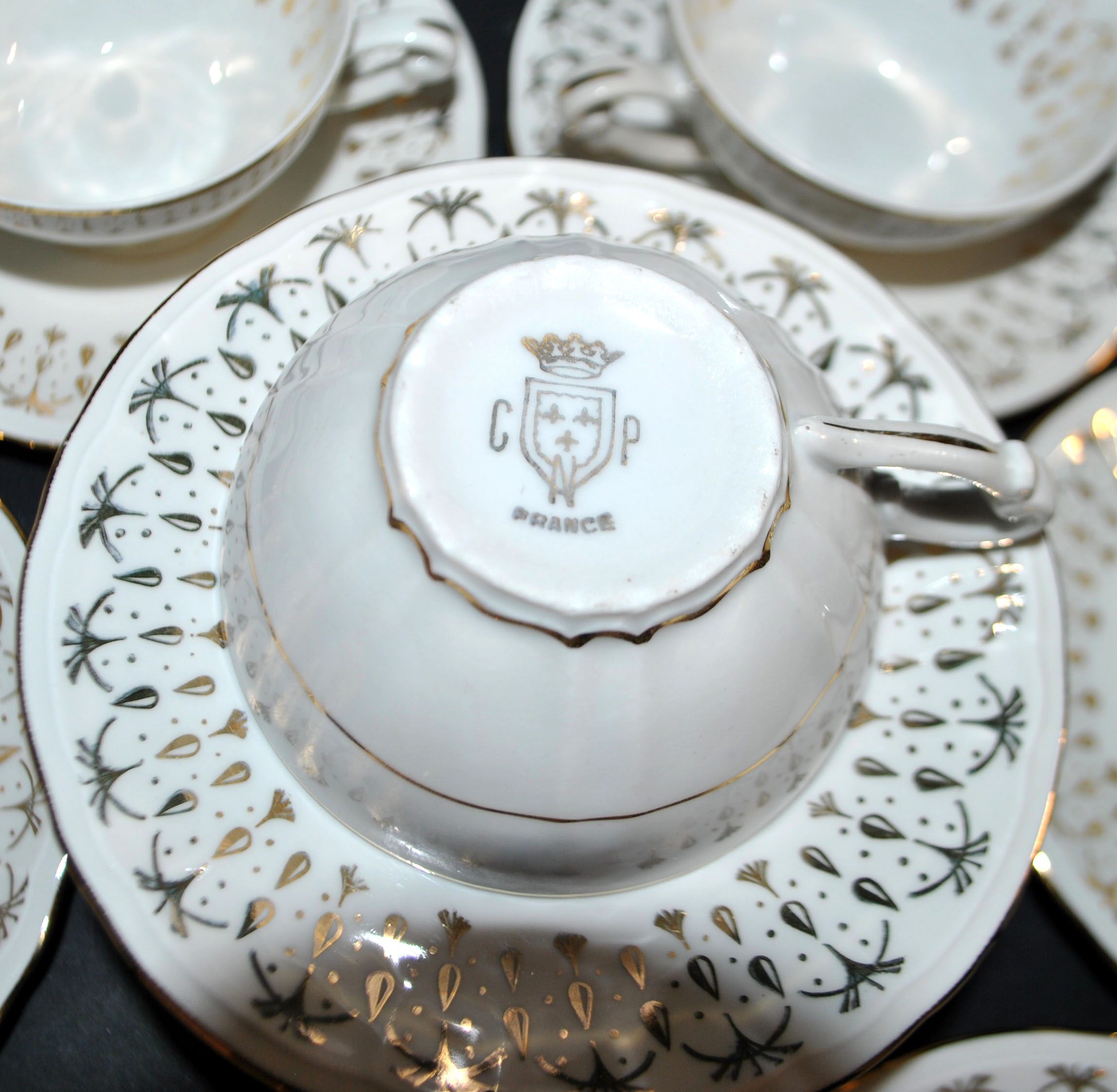 CNP set of 11 porcelain coffee cups from the National Porcelain Company Berry.