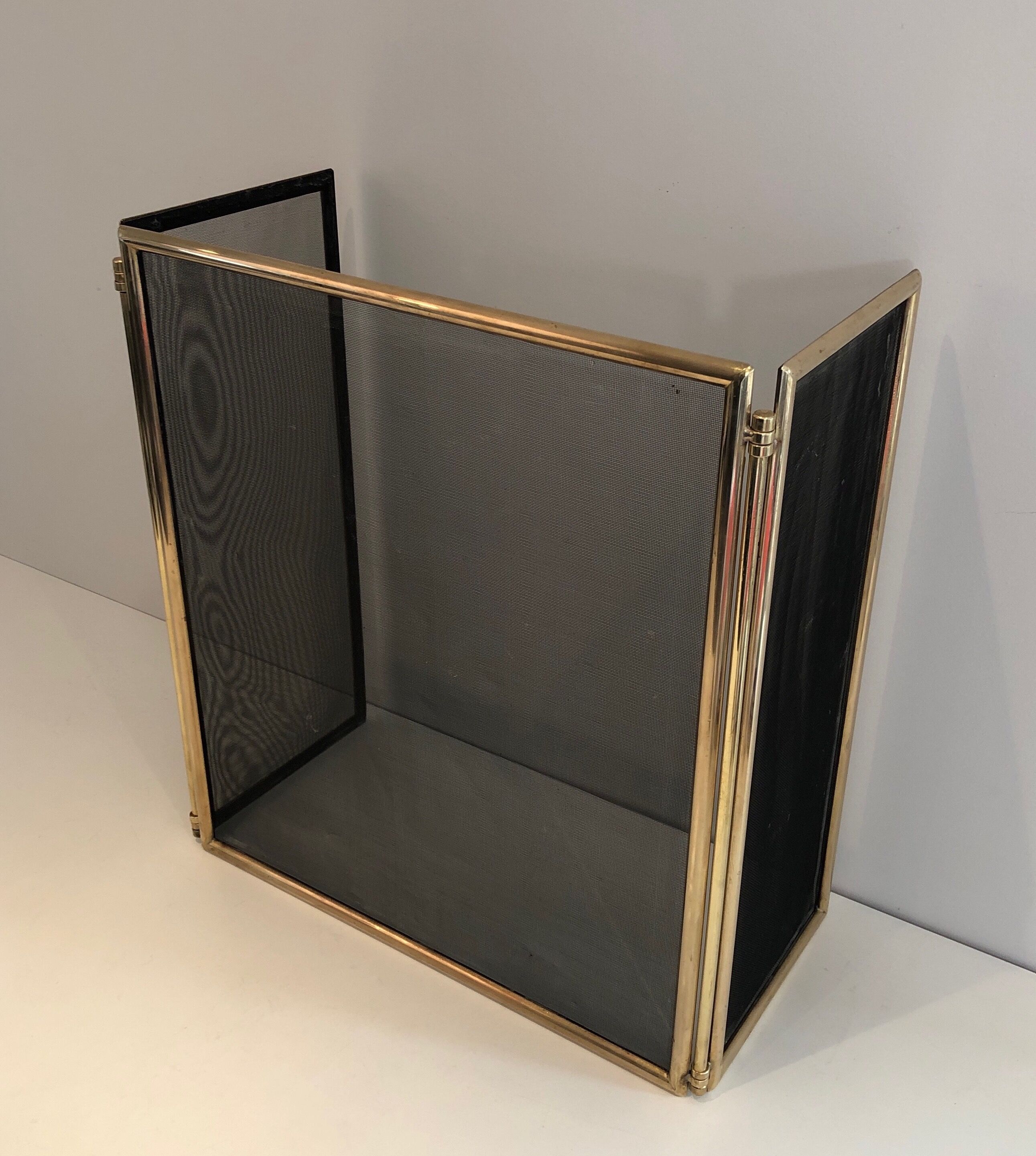 Brass and wire mesh firewall. french work. around 1970