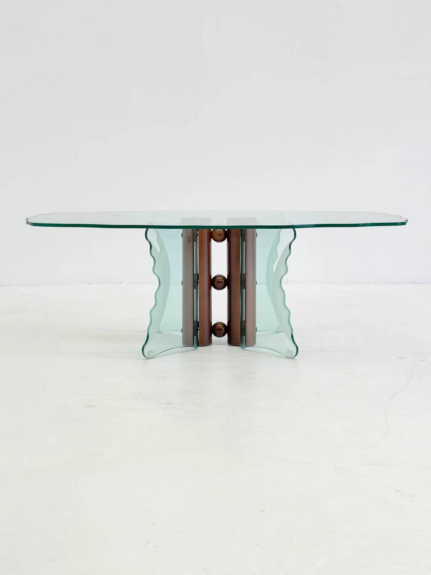 Vintage postmodern coffee table with wavy glass and wooden spheres