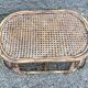 Pair of rattan armchairs and vintage oval table