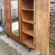Art Deco wardrobe in flame walnut with central mirror – French elegance