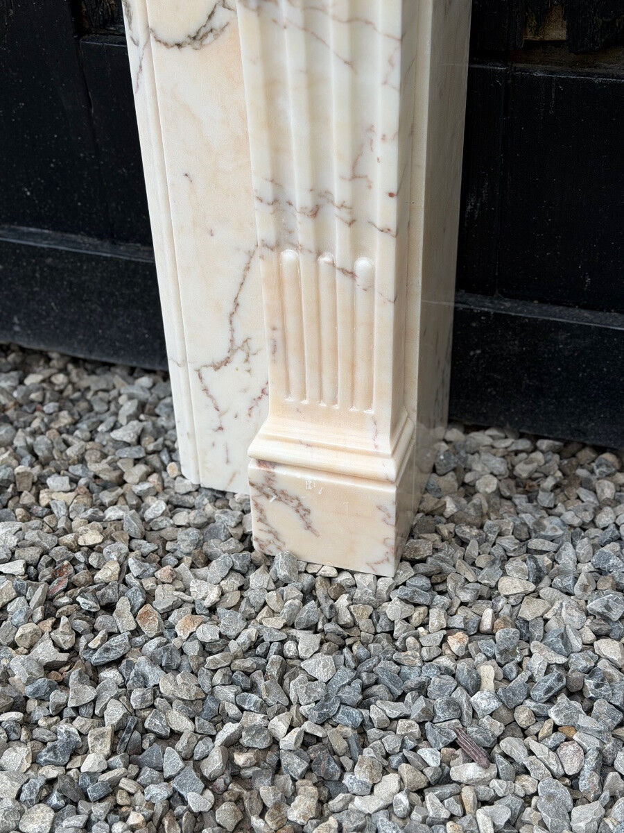 Louis XVI style pink marble fireplace, circa 1980.