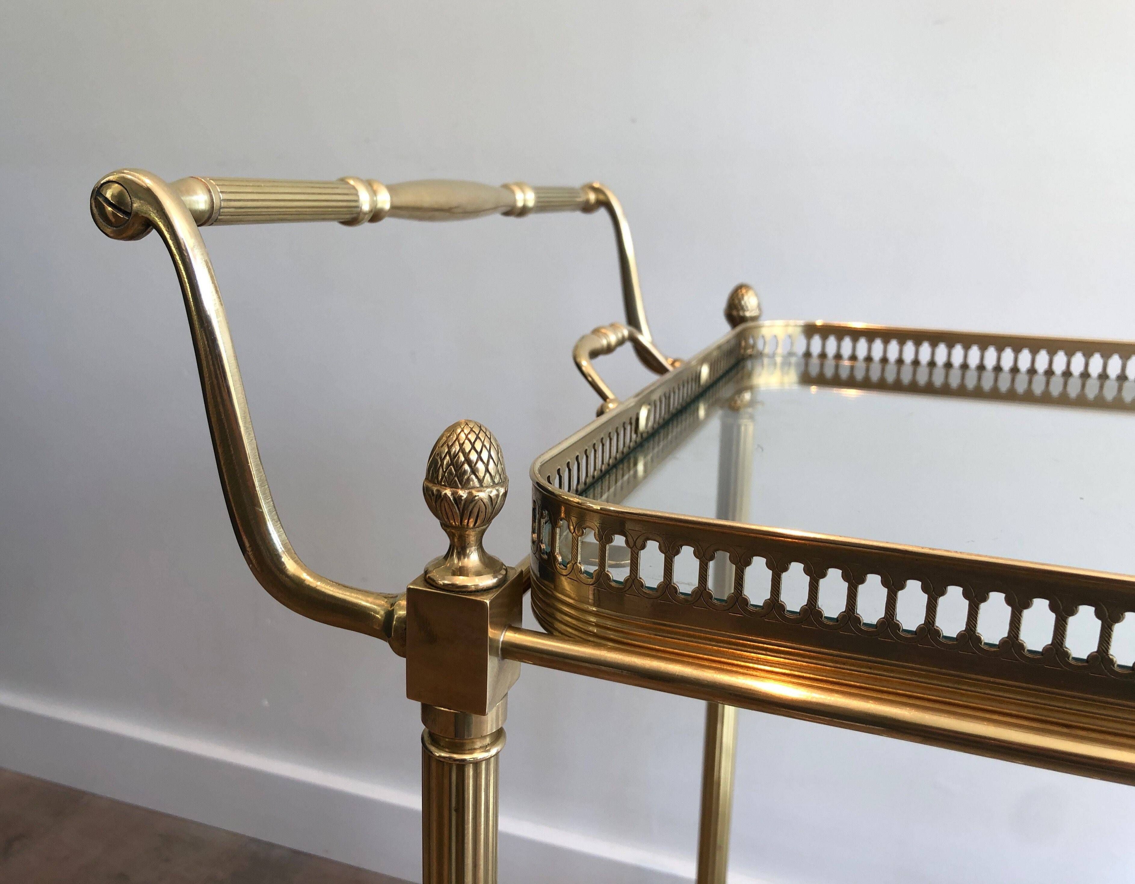 Brass rolling table with removable double trays from Maison Jansen.