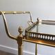 Brass rolling table with removable double trays from Maison Jansen.