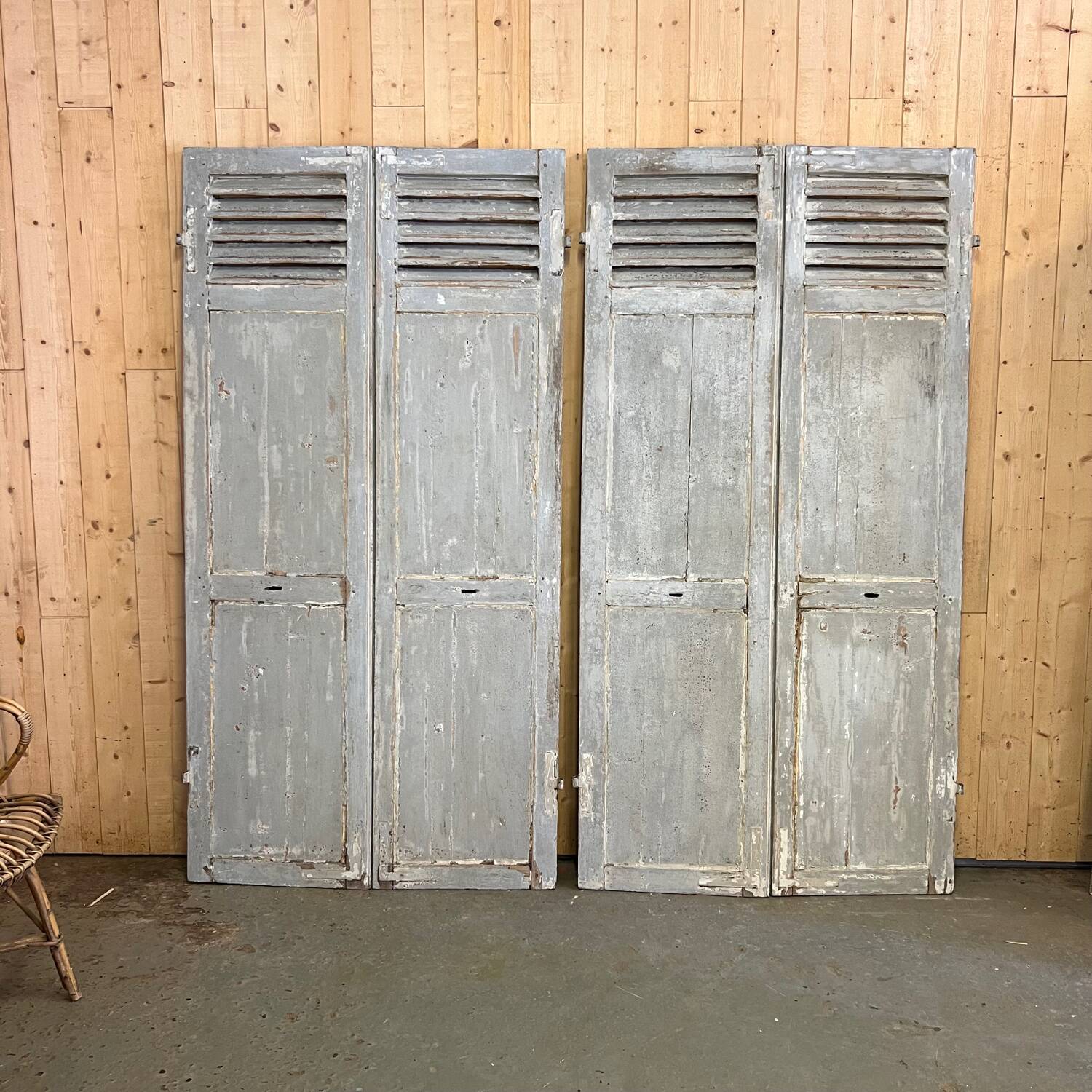 Pair of patinated gray shutters