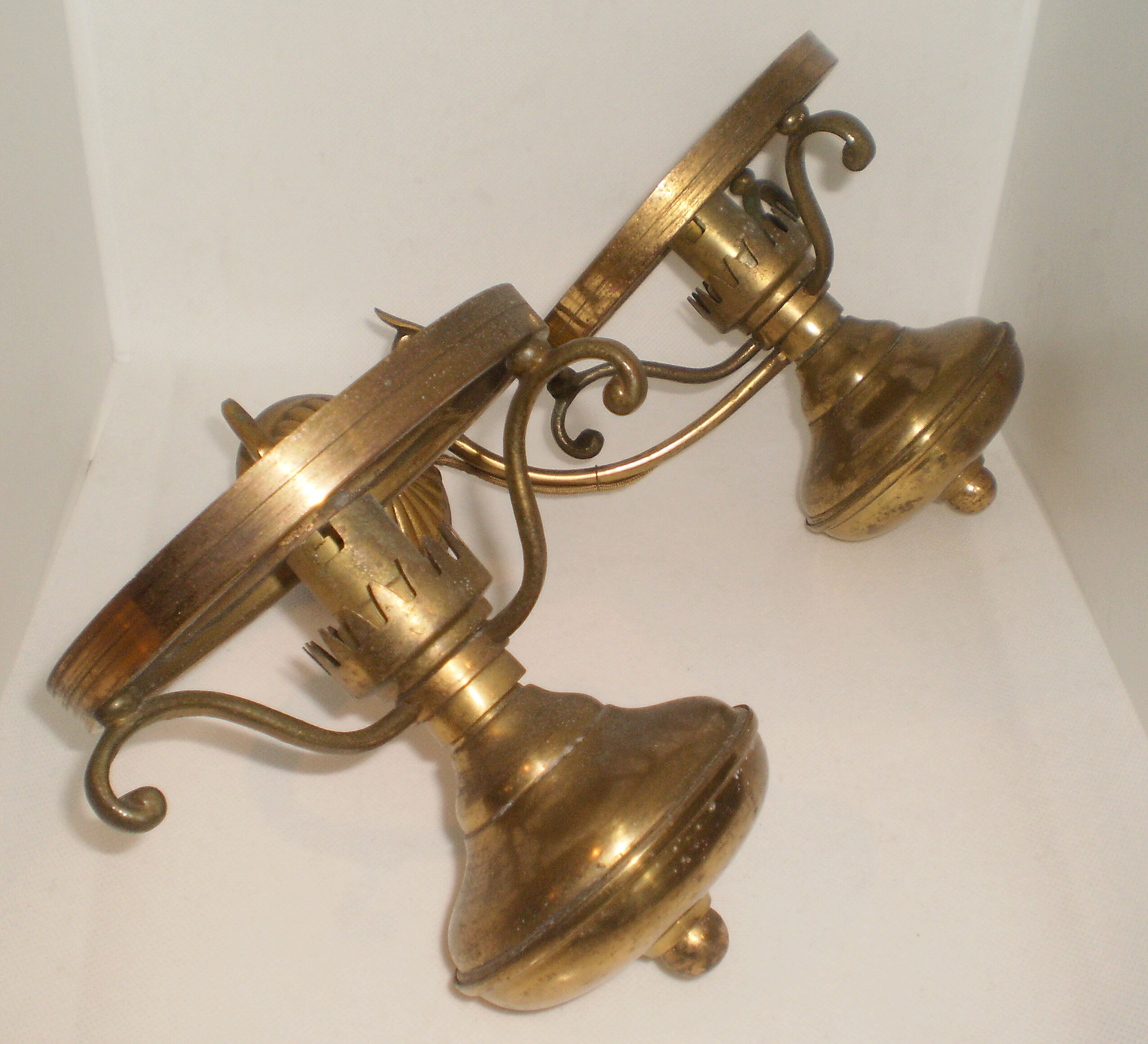 Glass brass globe sconce