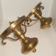 Glass brass globe sconce