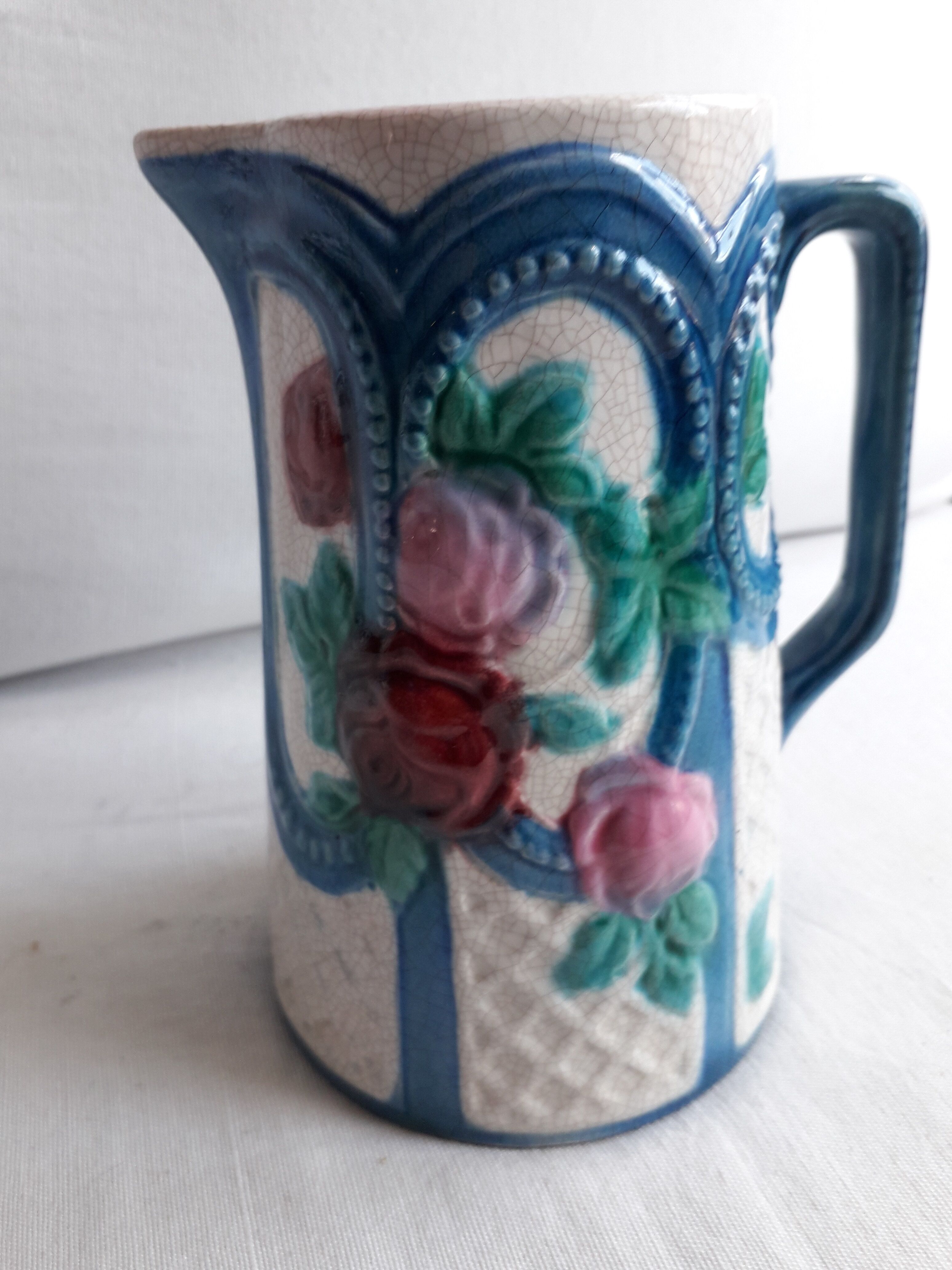 Vintage pitcher in slurry signed