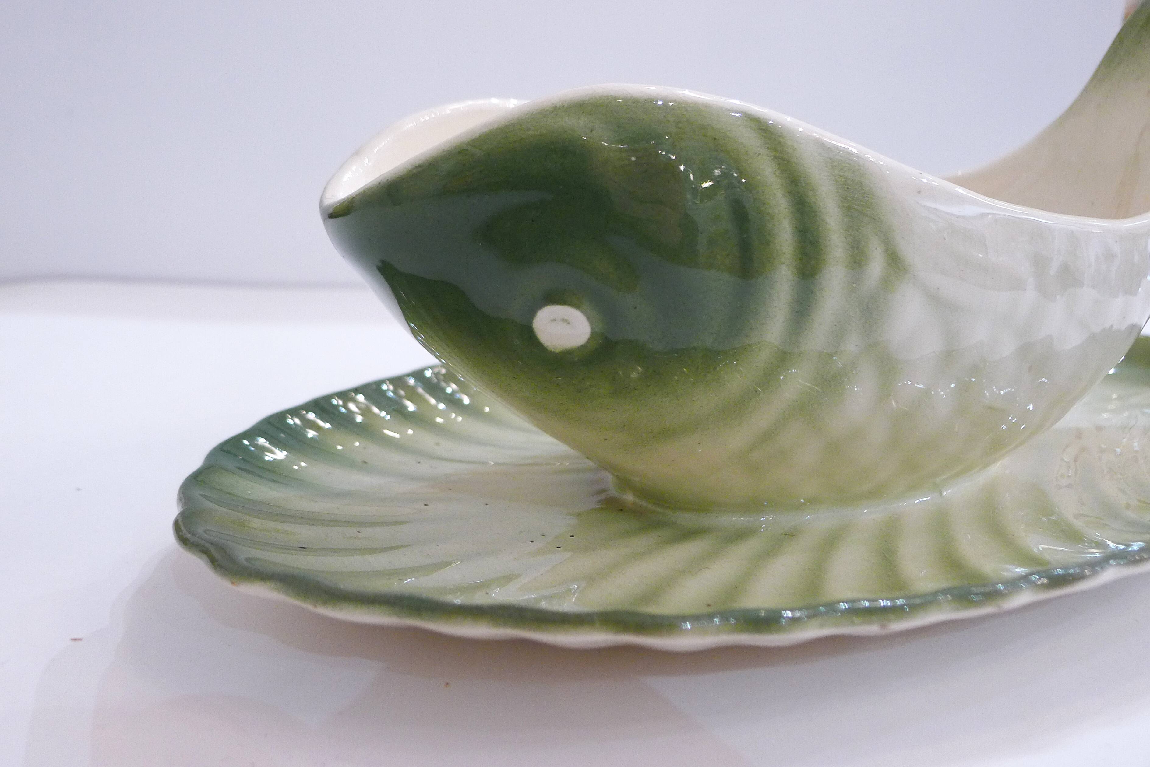 Fish dabbling sauce dish by Longwy