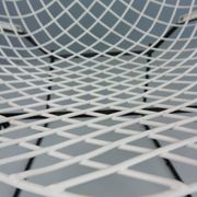 Set of two Diamond chair by Harry Bertoia in white & black metal. 1960s