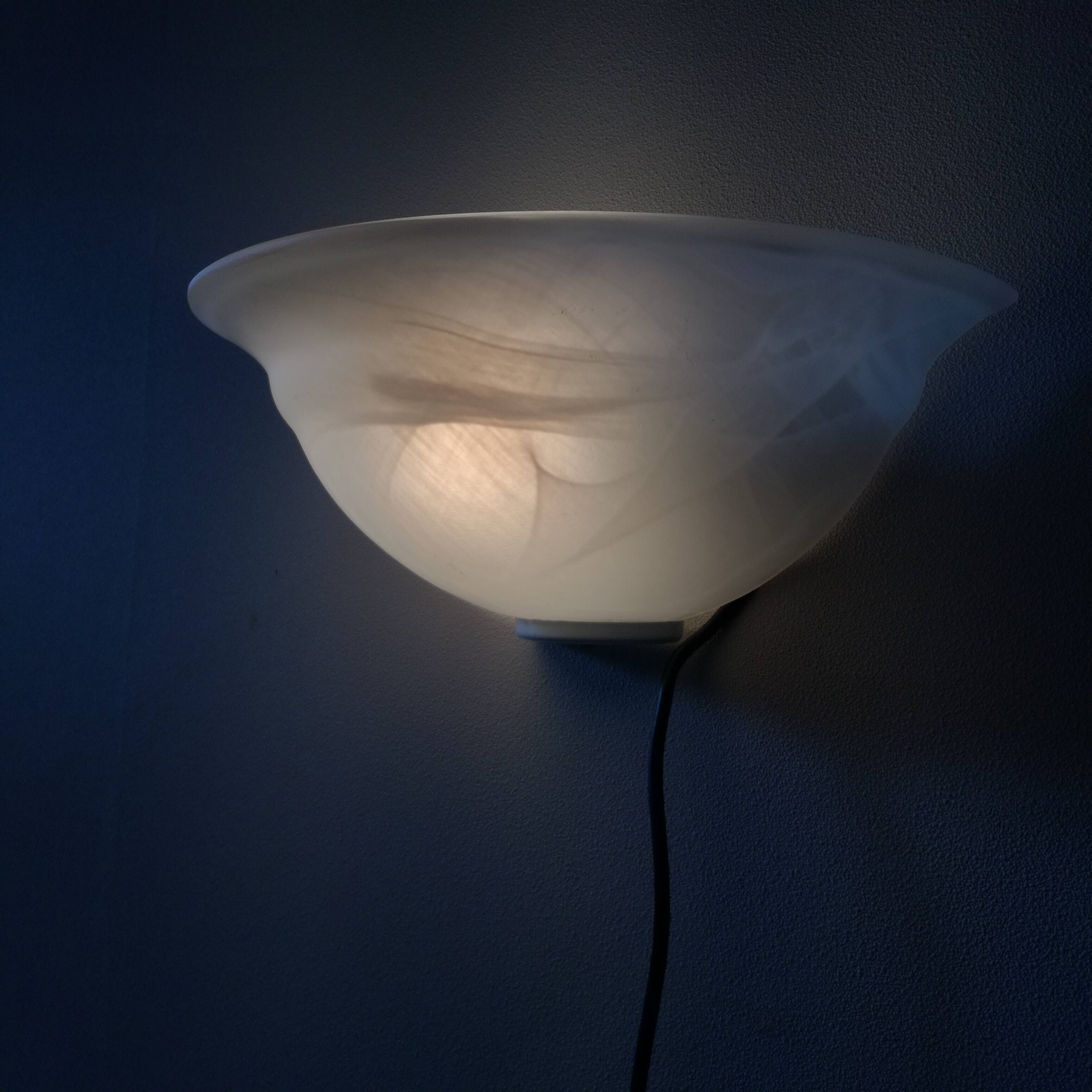 Half bell wall light in milky glass
