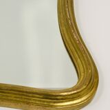 Curved wall mirror in gilded wood Chelini Firenze, mid-century, Italy, 1950s.