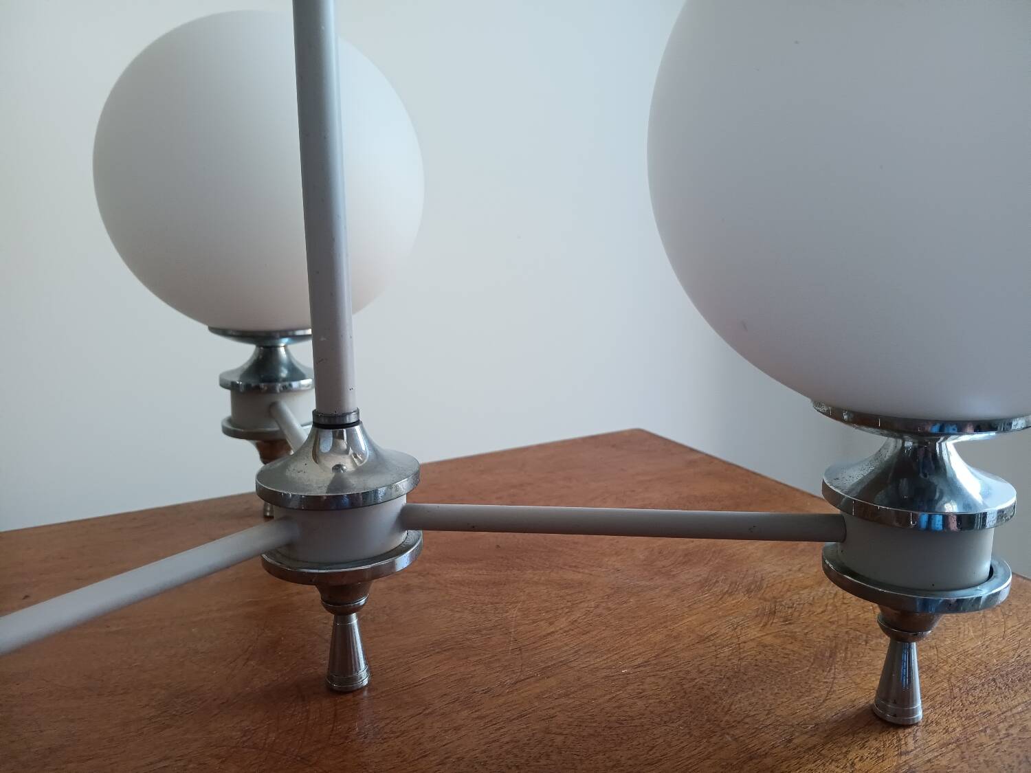 White ball and metal chandelier