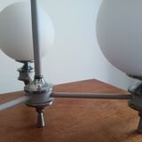 White ball and metal chandelier