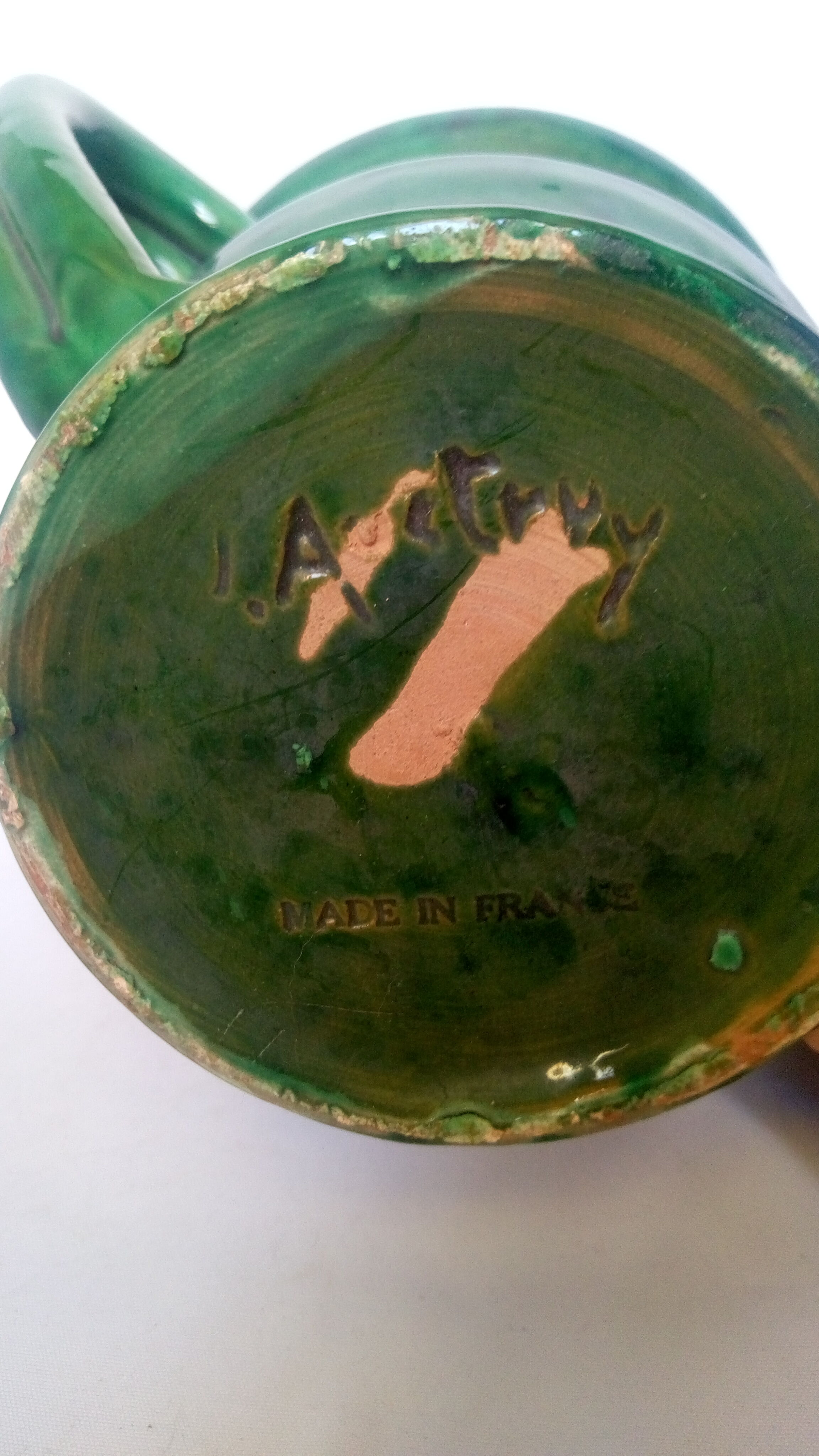 Jean Austruy enamelled green vase