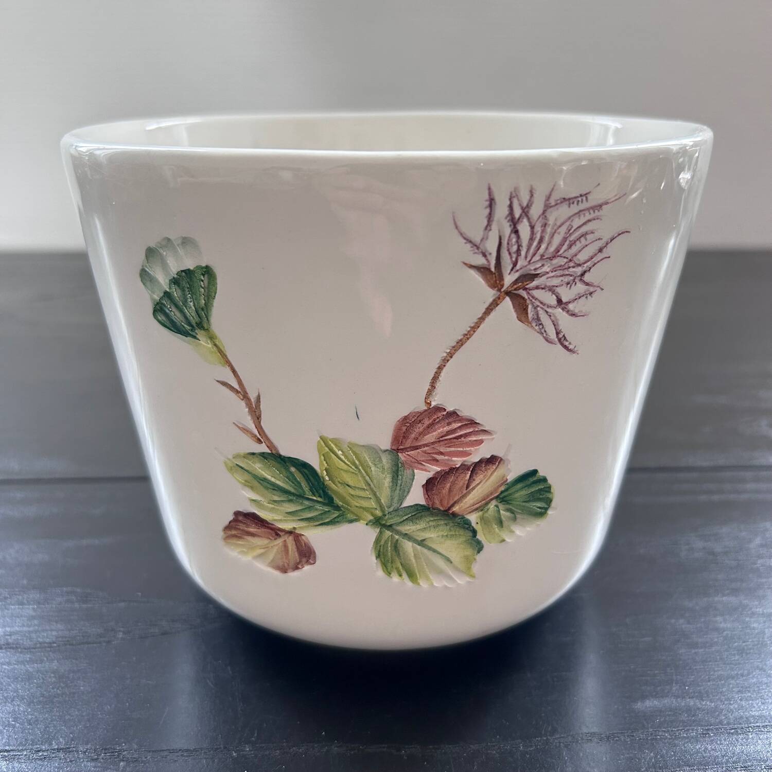 Flower pot with floral decoration in slip