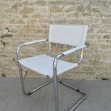 Armchair in chrome and leather