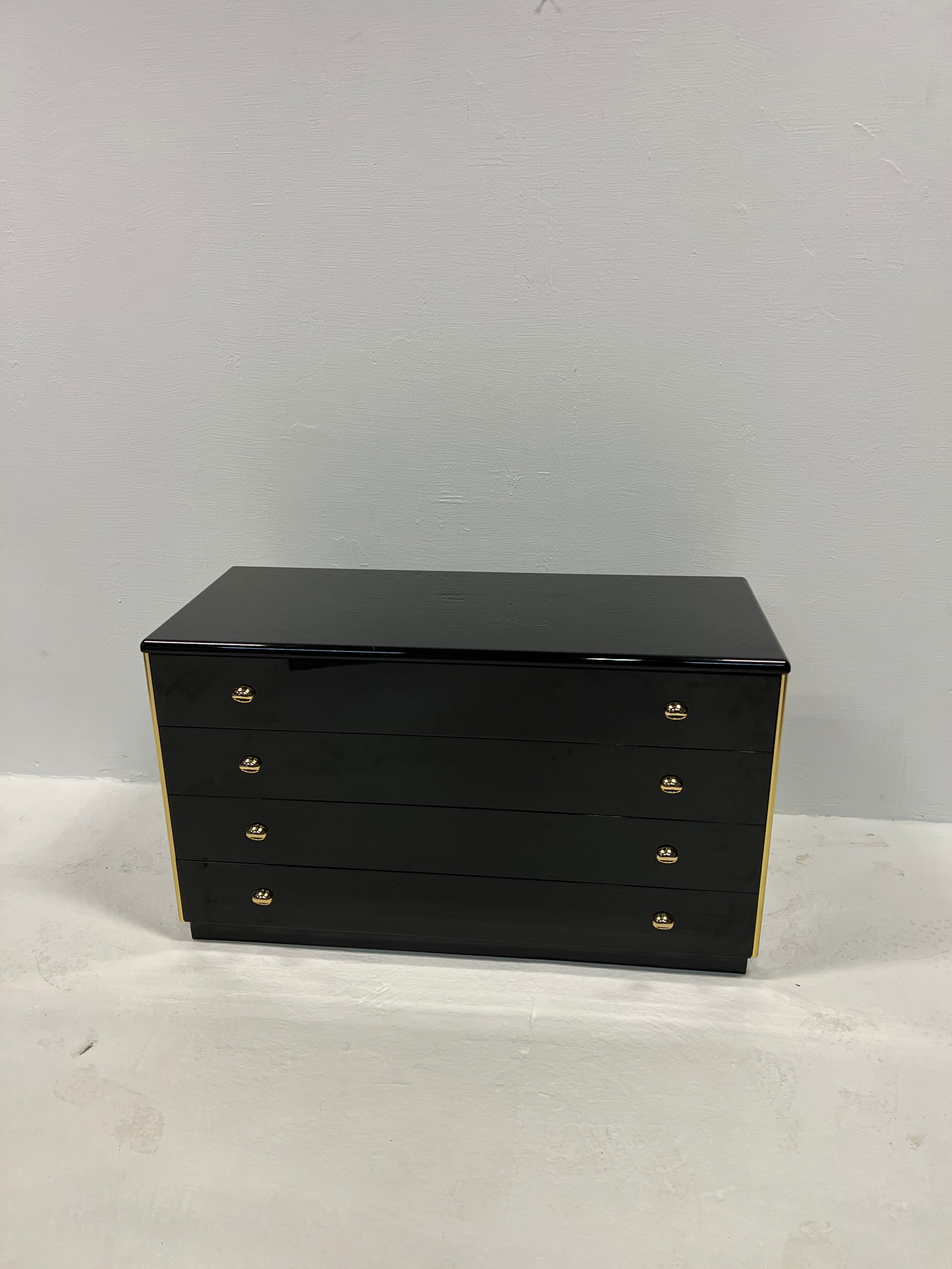 Black lacquered chest of drawers