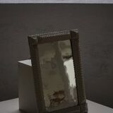 Wall mirror in tramp art style, hand-carved with a painted white frame, early 1900s.