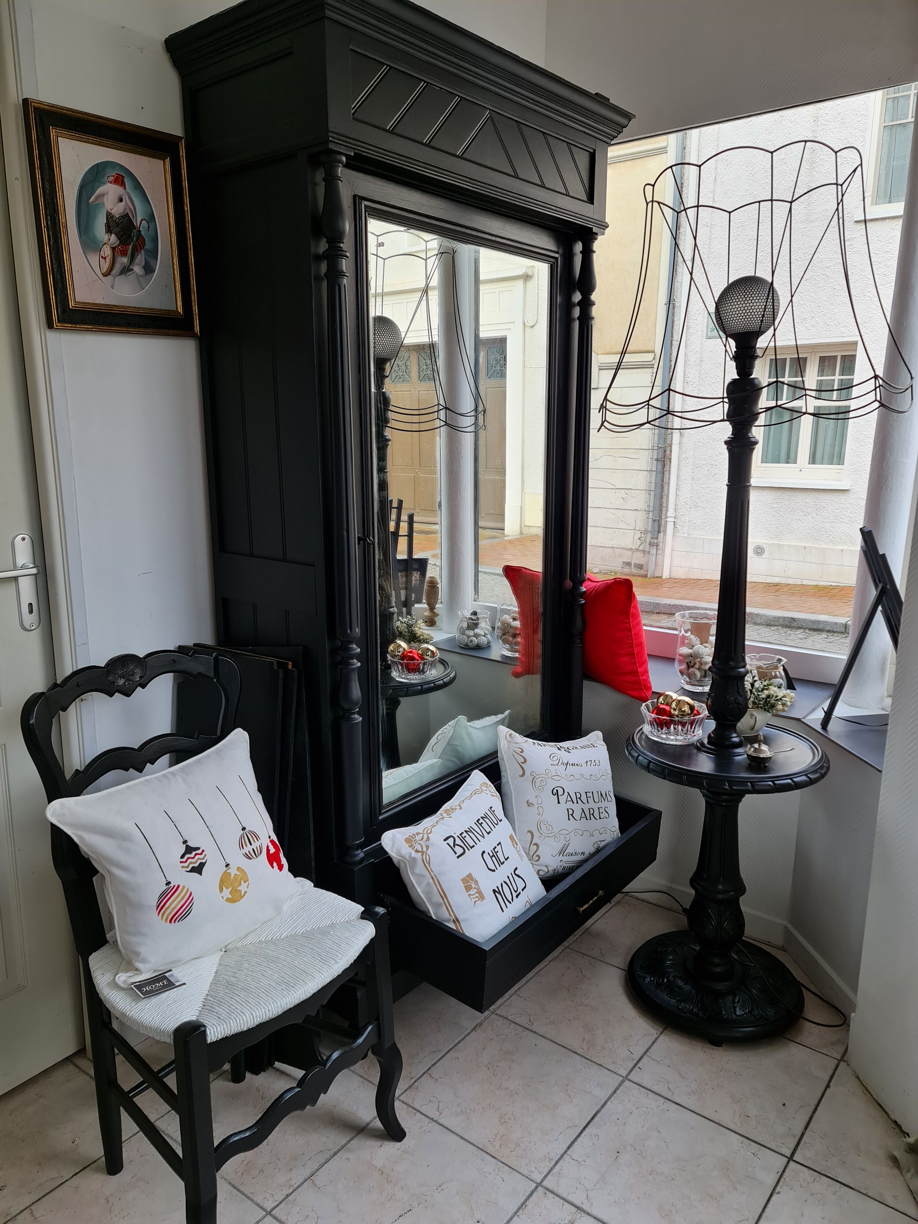 Matte black lamppost with small tablet