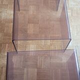 Trio of 70s smoked plexiglass nesting tables