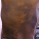 Wingback armchair in dark brown patinated leather, 1970s