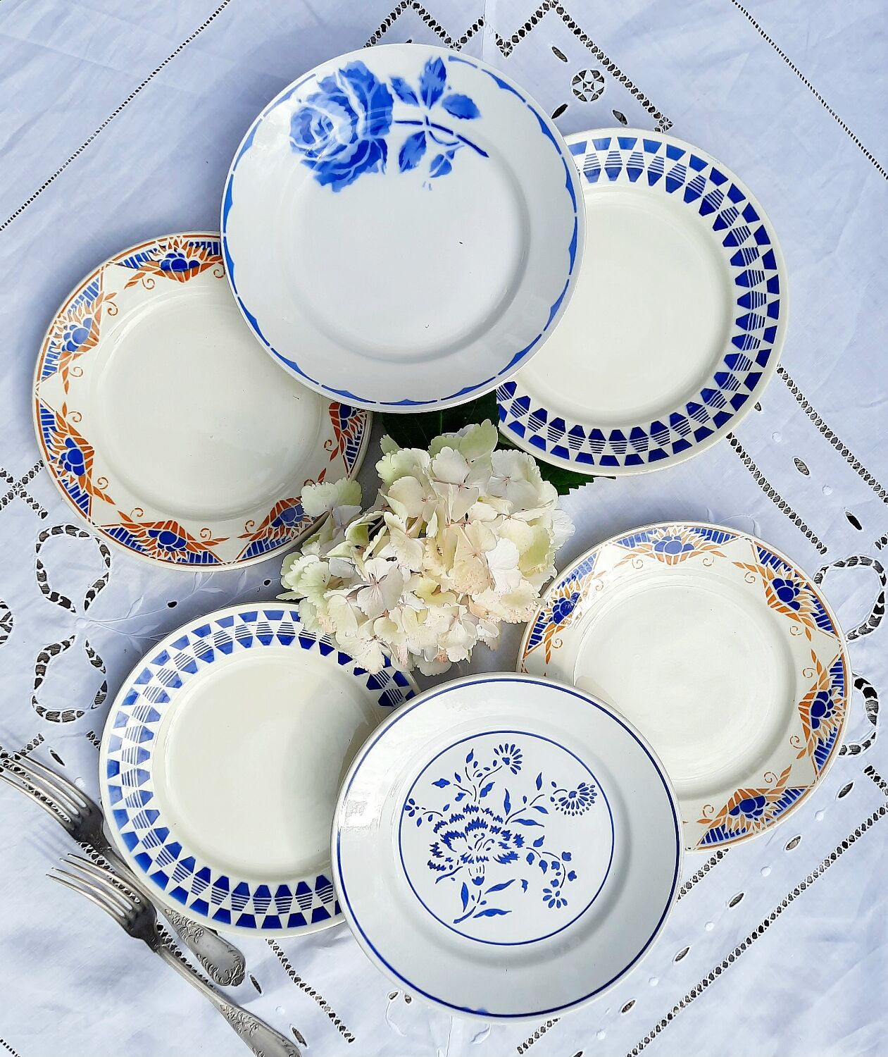 Old flat plates mismatched in earthenware