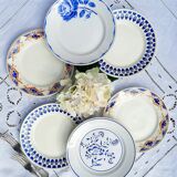 Old flat plates mismatched in earthenware