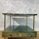 Aldo Tura side table in aqua green with brass legs and lower drawer.