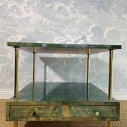 Aldo Tura side table in aqua green with brass legs and lower drawer.