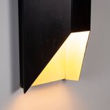 Architectural pair of vintage black metal wall lamps with angular geometric
