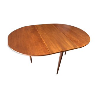 Teak round table with built-in extension