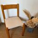Vintage wooden chair with cream white corduroy seat