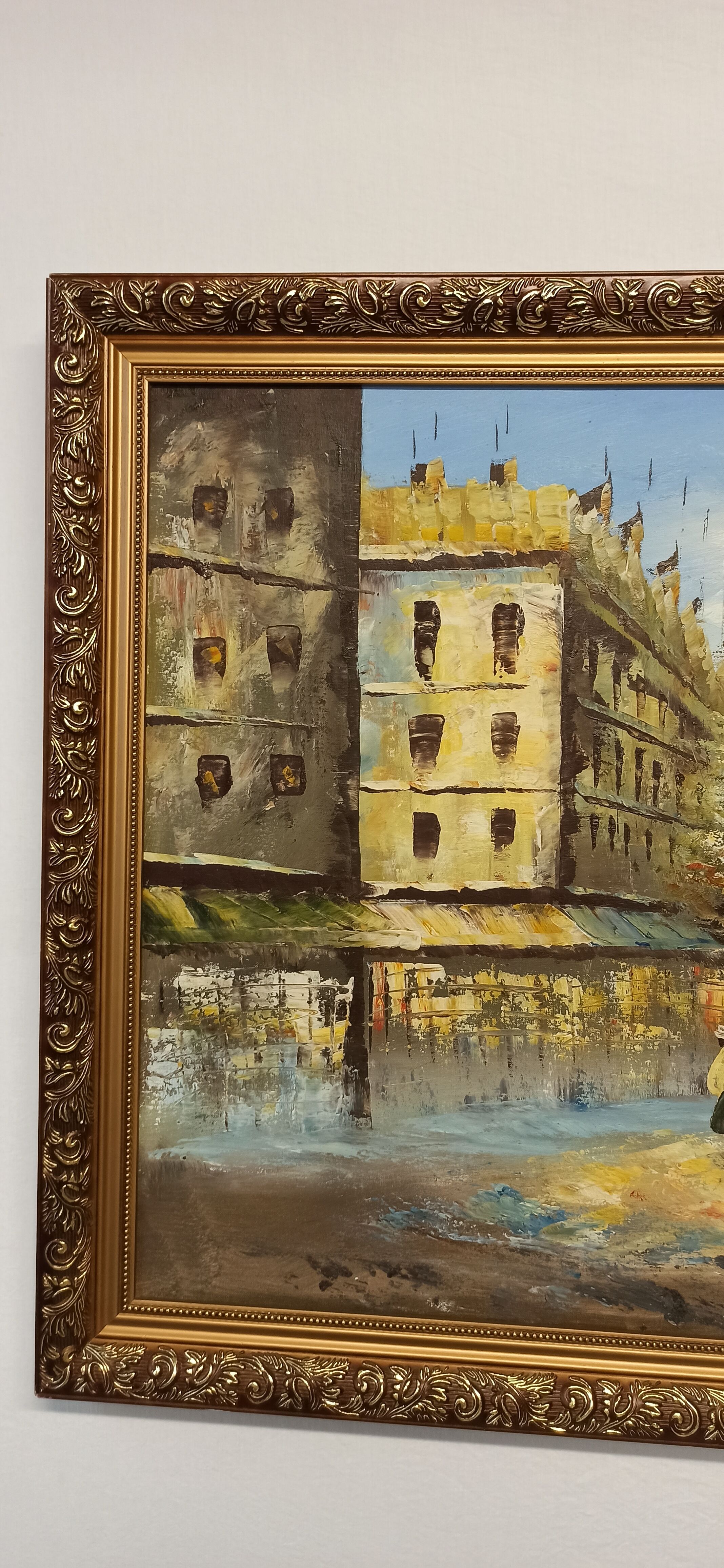 Painting framed by a view of Paris