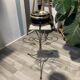 Gold wrought iron ashtray on legs with magazine rack and marbled shelf