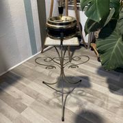 Gold wrought iron ashtray on legs with magazine rack and marbled shelf