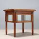 Antique display table in mahogany, glass and bronze, Italy, 19th century.