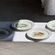 Set of 6 vintage Limoges porcelain plates with fish design.