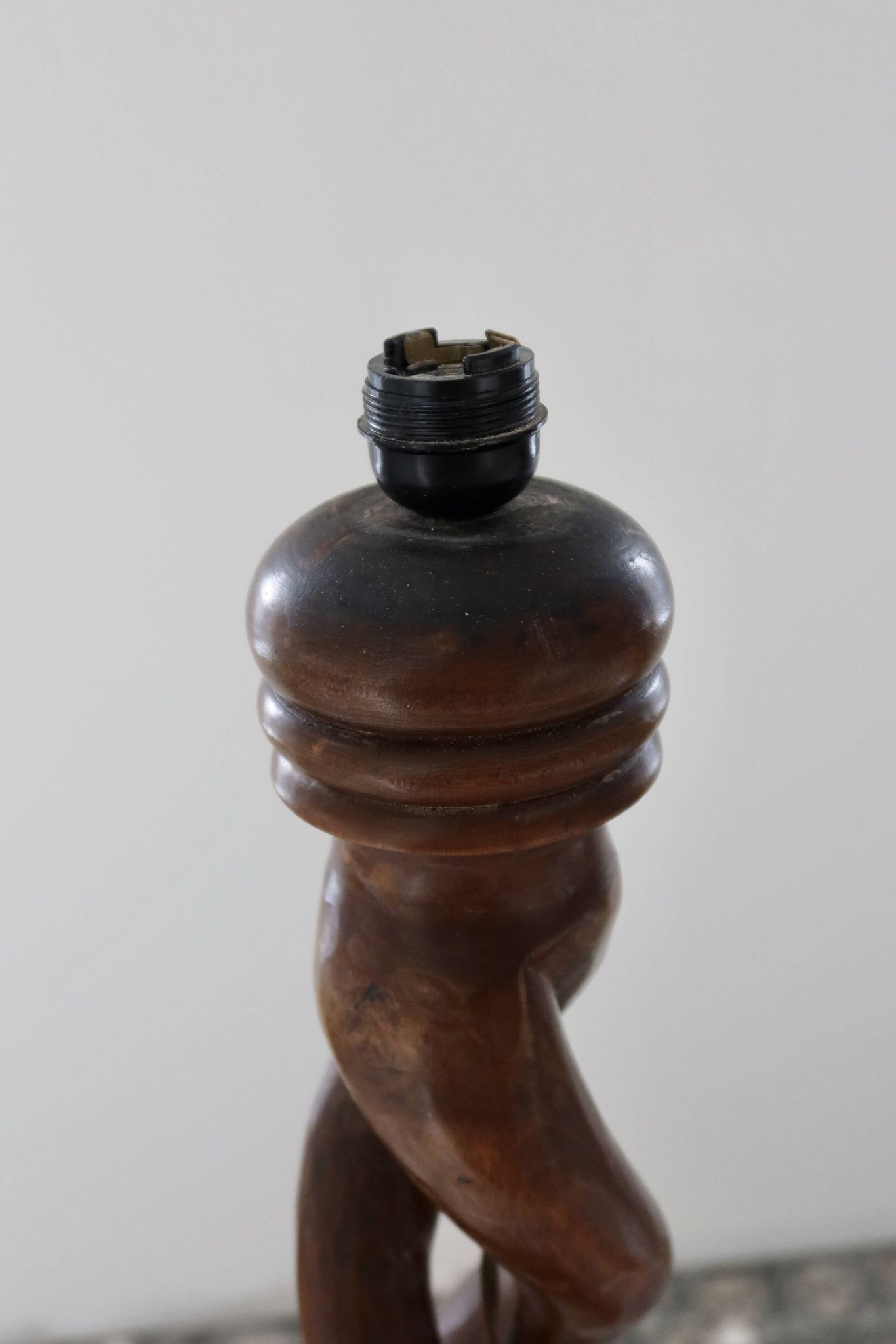 Vintage twisted turned wooden lamp base with shelf.