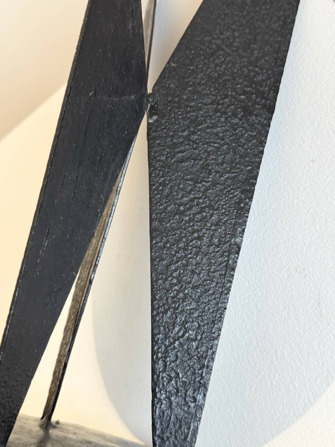 Vintage black metal brutalist tripod candlestick