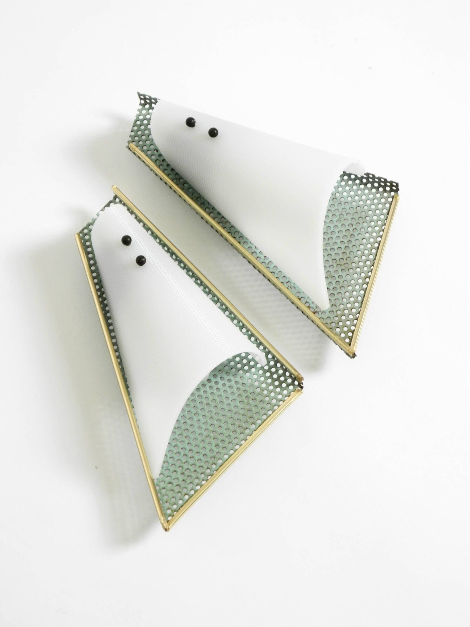 Pair of beautiful mint green Mid Century Modern perforated sheet metal wall