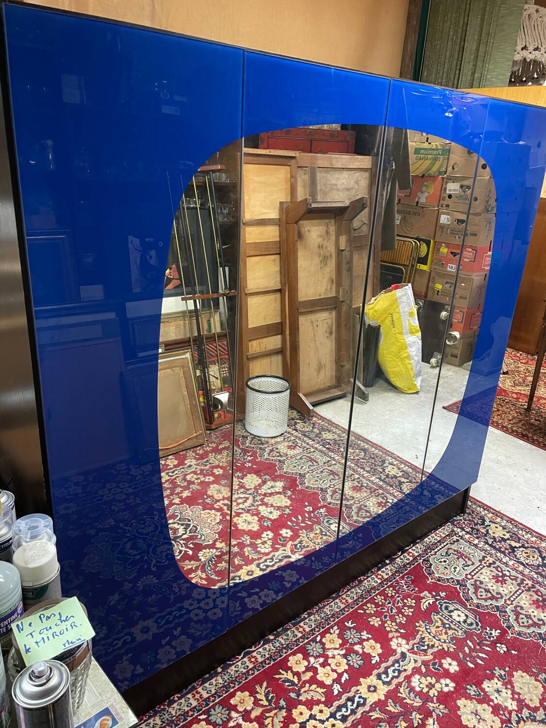 Vintage blue mirror wardrobe from the 70s.