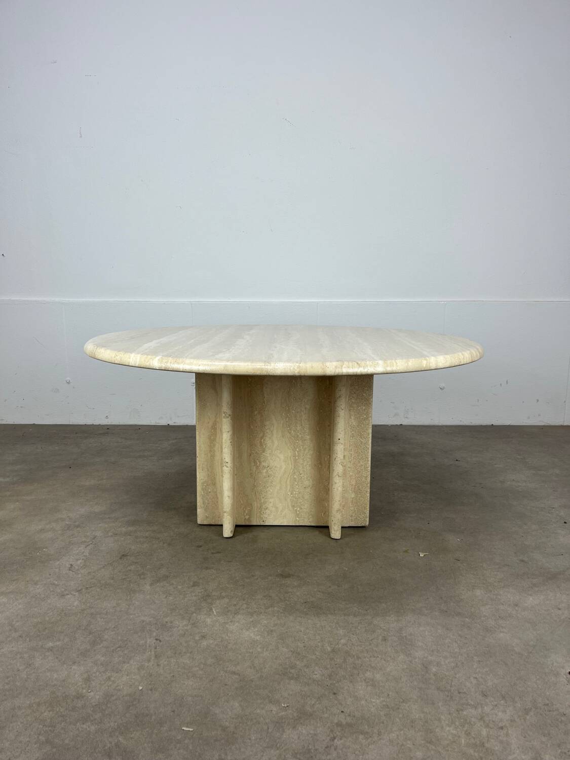 Round travertine coffee table