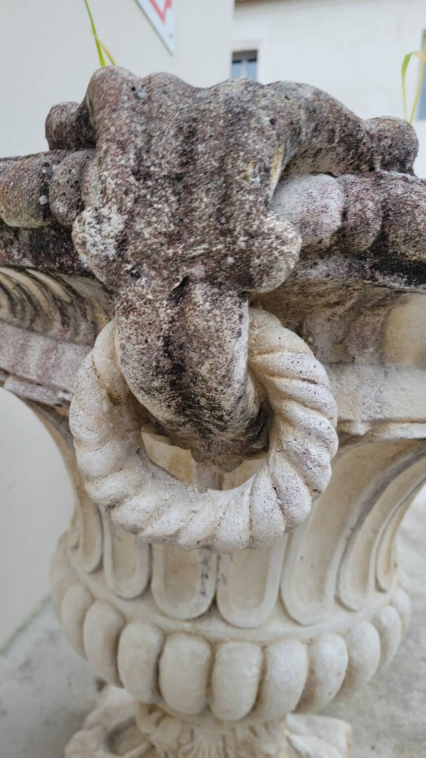 Pair of planter vases decorated with faces in reconstituted stone 1950s