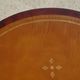 Small side table with an oval top in English style.