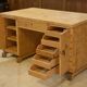 English desk in birch veneer with bee pattern marquetry from the 1950s.