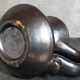 1950s iridescent black ceramic hand candle holder
