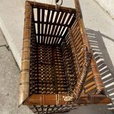 Brown wicker/rattan basket-shaped magazine rack
