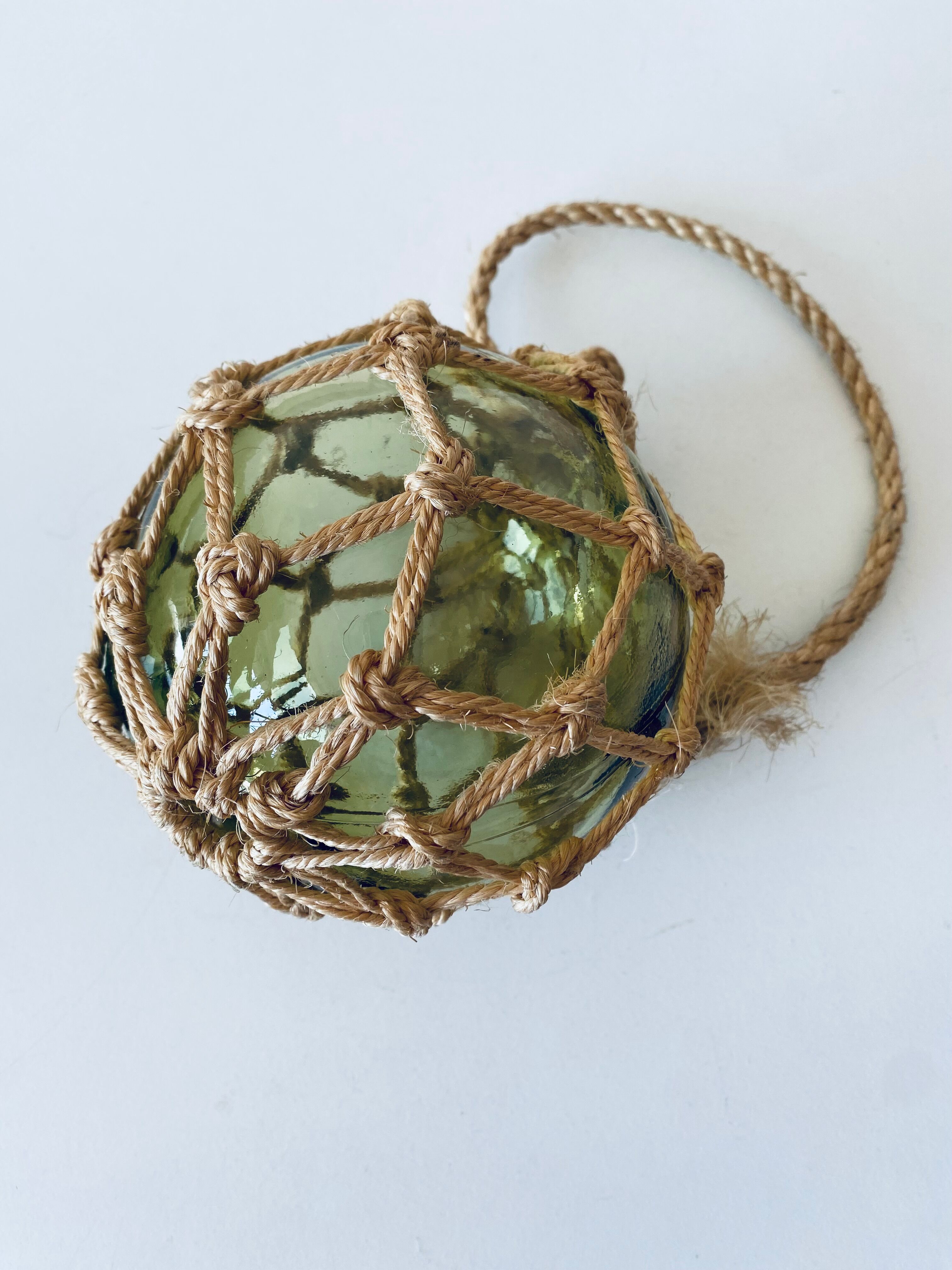 Antique fisherman's ball, old fishing floats