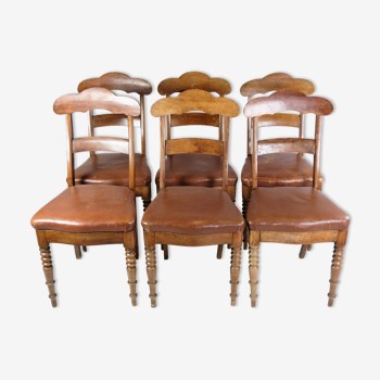Set of eight late empire chairs in high quality brown leather in mahogany